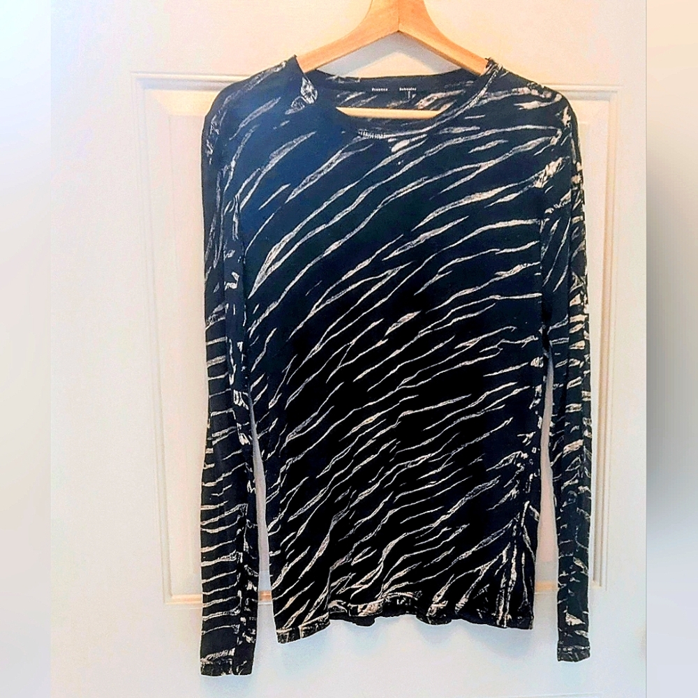 Proenza Schouler tiger stripe long sleeve shirt.